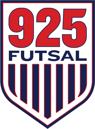Shield-shaped logo for 925 FUTSAL featuring large red numerals above navy text and vertical navy and white stripes, reminiscent of a U.S. soccer crest.