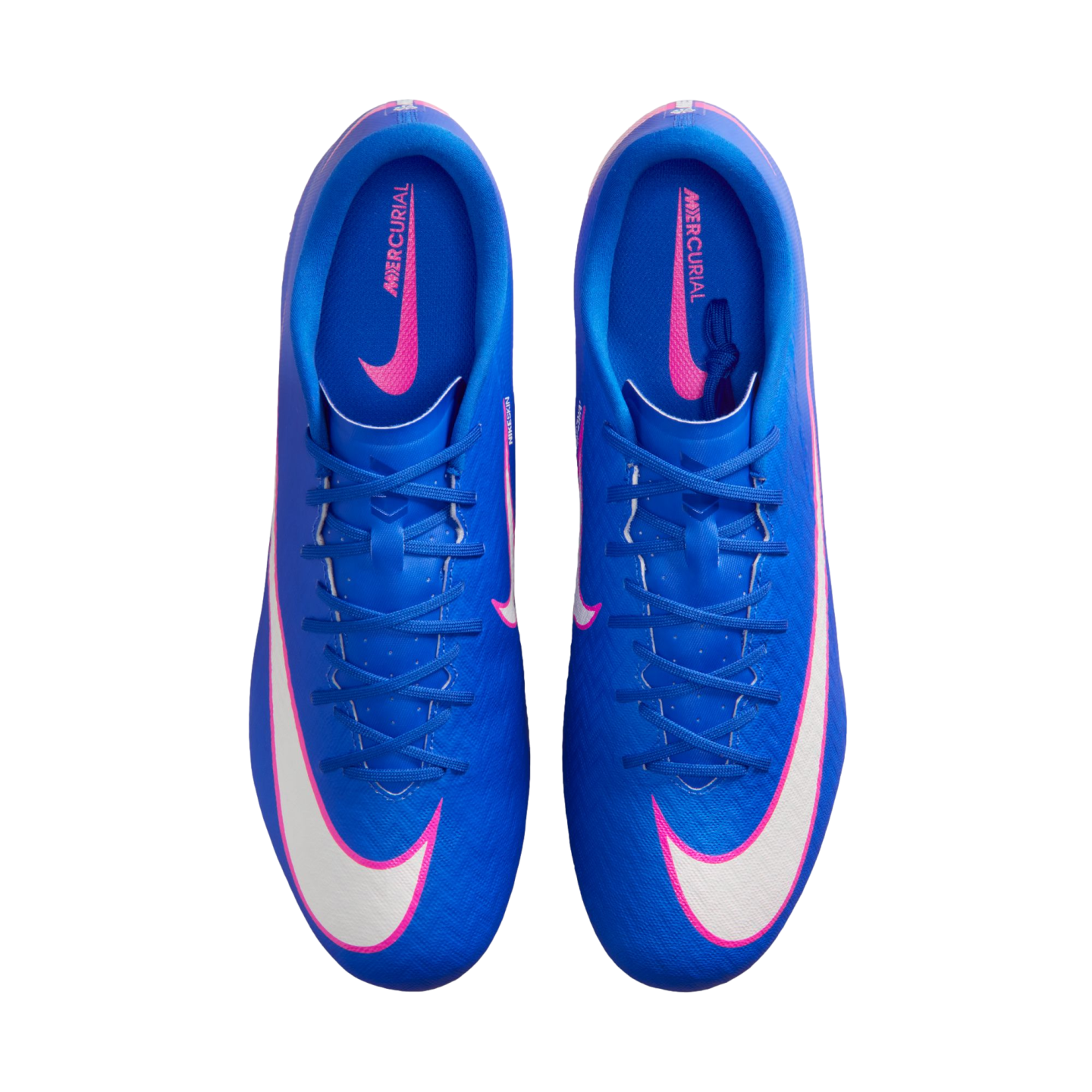 Top-down view of a pair of blue Nike Mercurial soccer cleats with large white and pink swooshes on a black background.