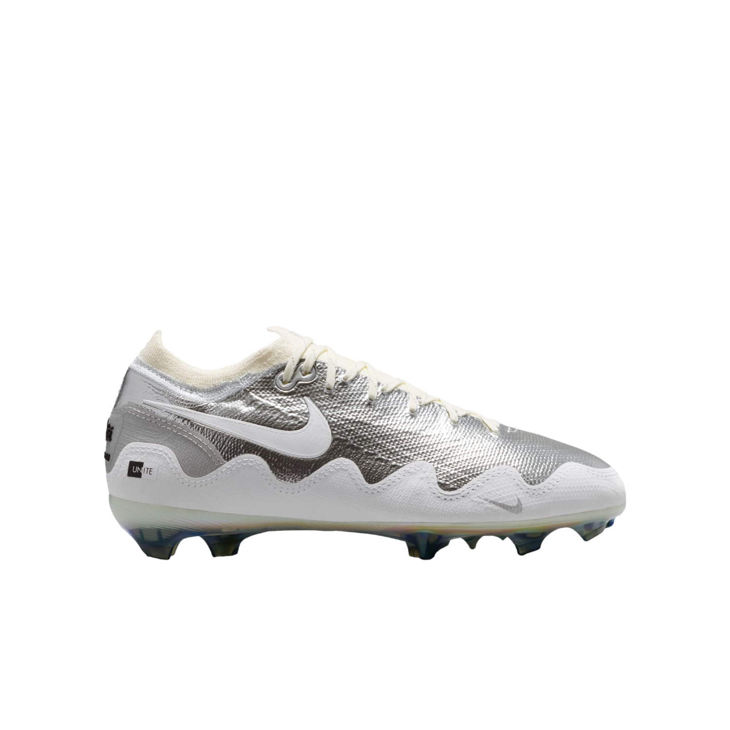 A side profile of a Nike soccer cleat with a textured metallic silver upper, a large white swoosh, and a white lower section. It features off-white laces and collar, with translucent blue studs on the sole, set against a solid black background.