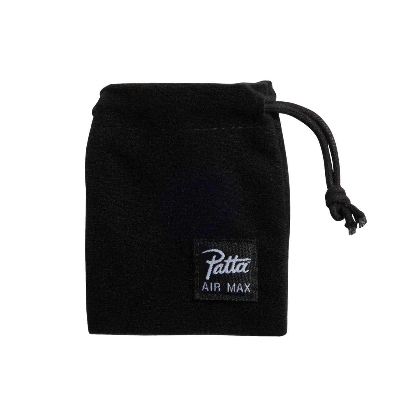 A small black velvet drawstring pouch is centered against a solid black background. A black tag is sewn on the lower right front with the “Patta” logo in white script above the words “AIR MAX” in a white sans-serif font. A black cord drawstring is visible on the right side of the bag's opening, tied in a knot.