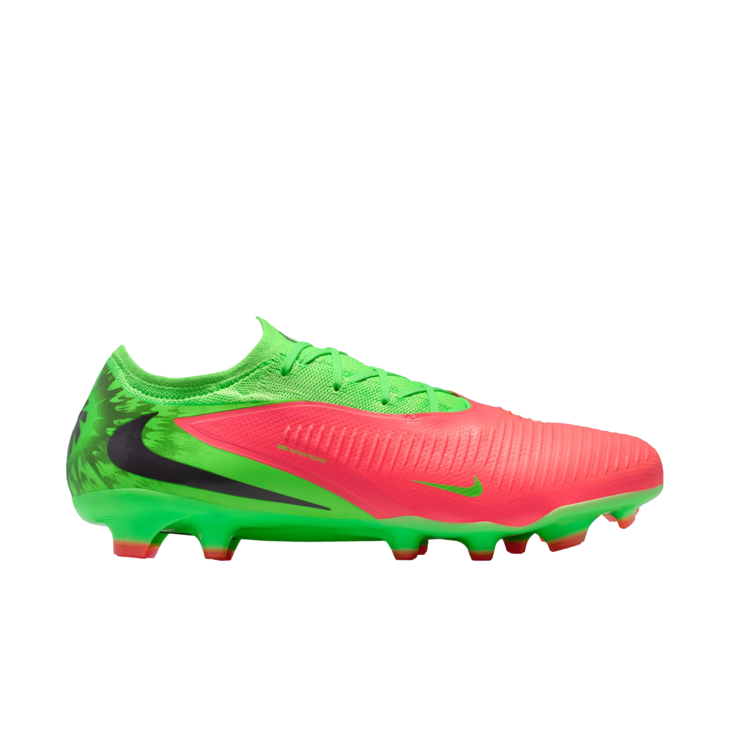 A profile view of a Nike soccer cleat in neon green and bright pink, featuring a large black swoosh on the side, set against a black background.