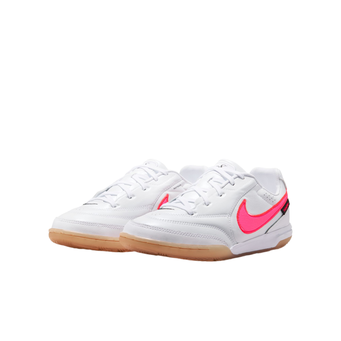 White Nike indoor soccer shoes with a neon pink swoosh and gum rubber soles.