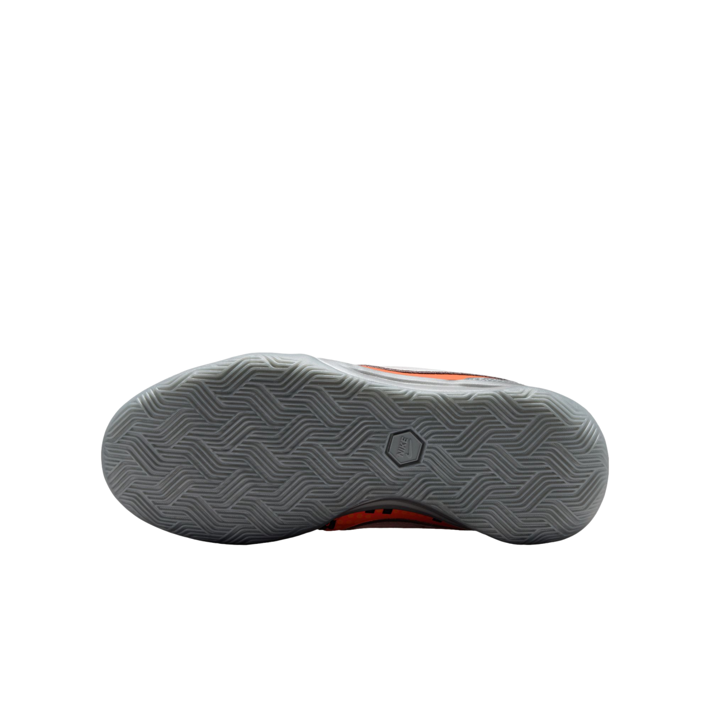 Bottom view of a Nike athletic shoe with a grey herringbone-patterned outsole. Orange and black accents are visible along the sides.
