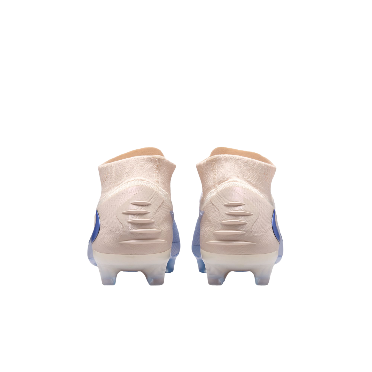 Rear view of peach-colored soccer cleats with blue accents and white translucent studs, set against a solid black background.