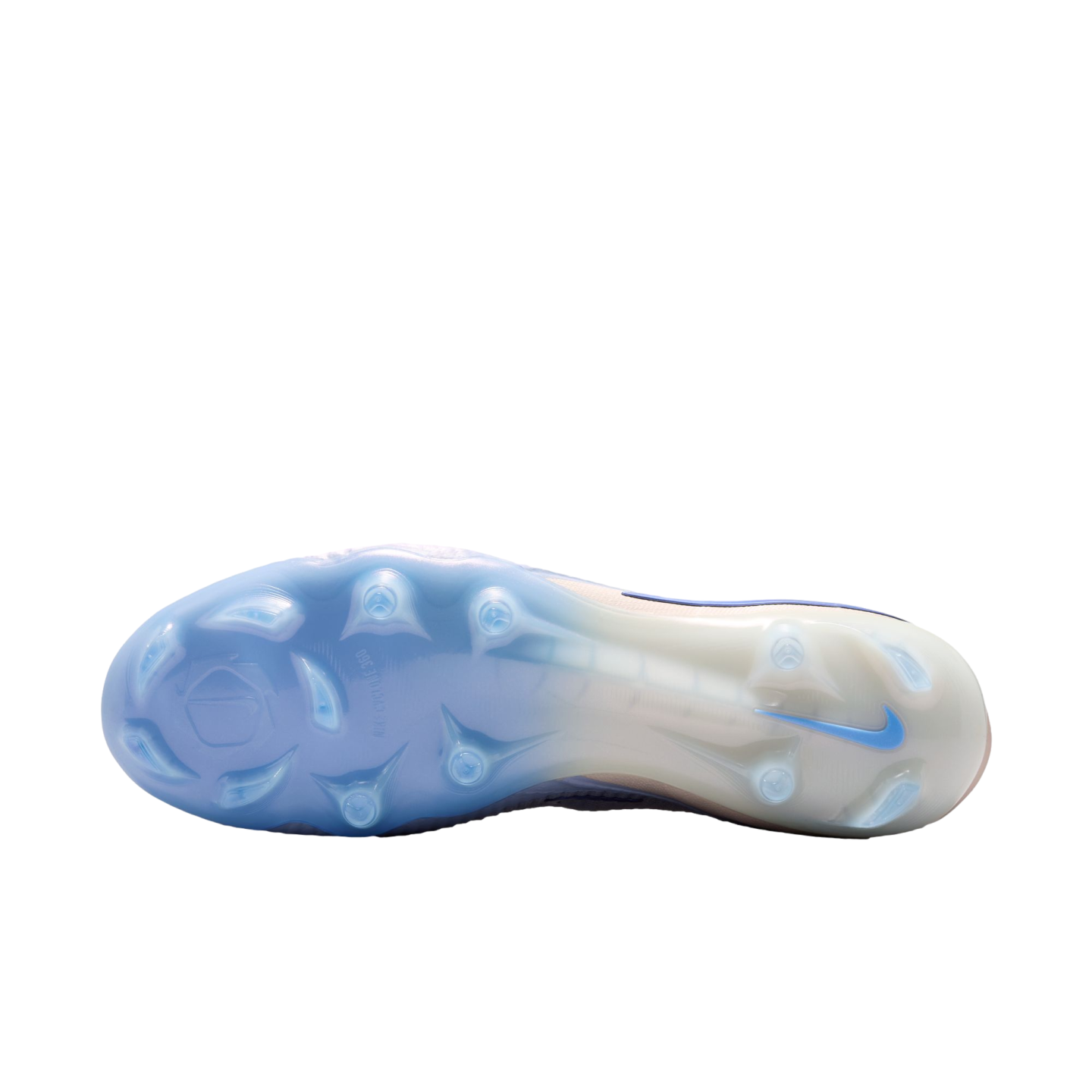 Translucent light blue and white soleplate of a Nike soccer cleat with molded studs.