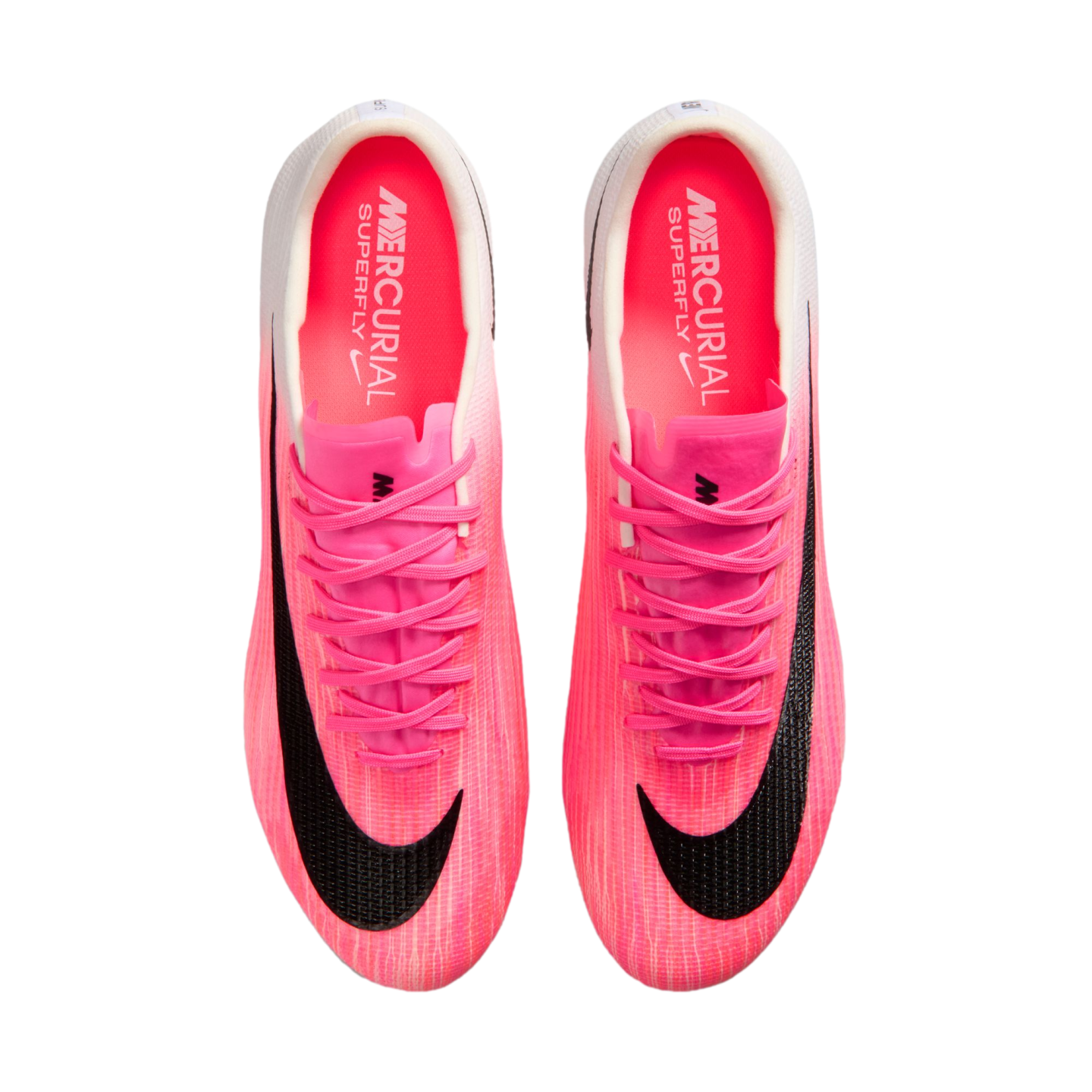 Top-down view of bright pink and white Nike Mercurial Superfly soccer cleats with black swooshes on a white background.