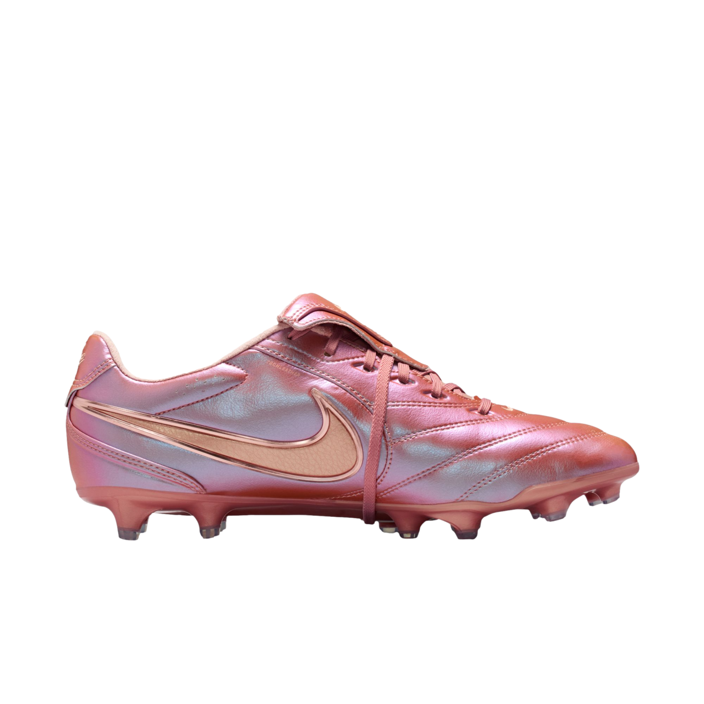 A side-profile view of an iridescent pink and rose gold Nike soccer cleat against a solid black background.
