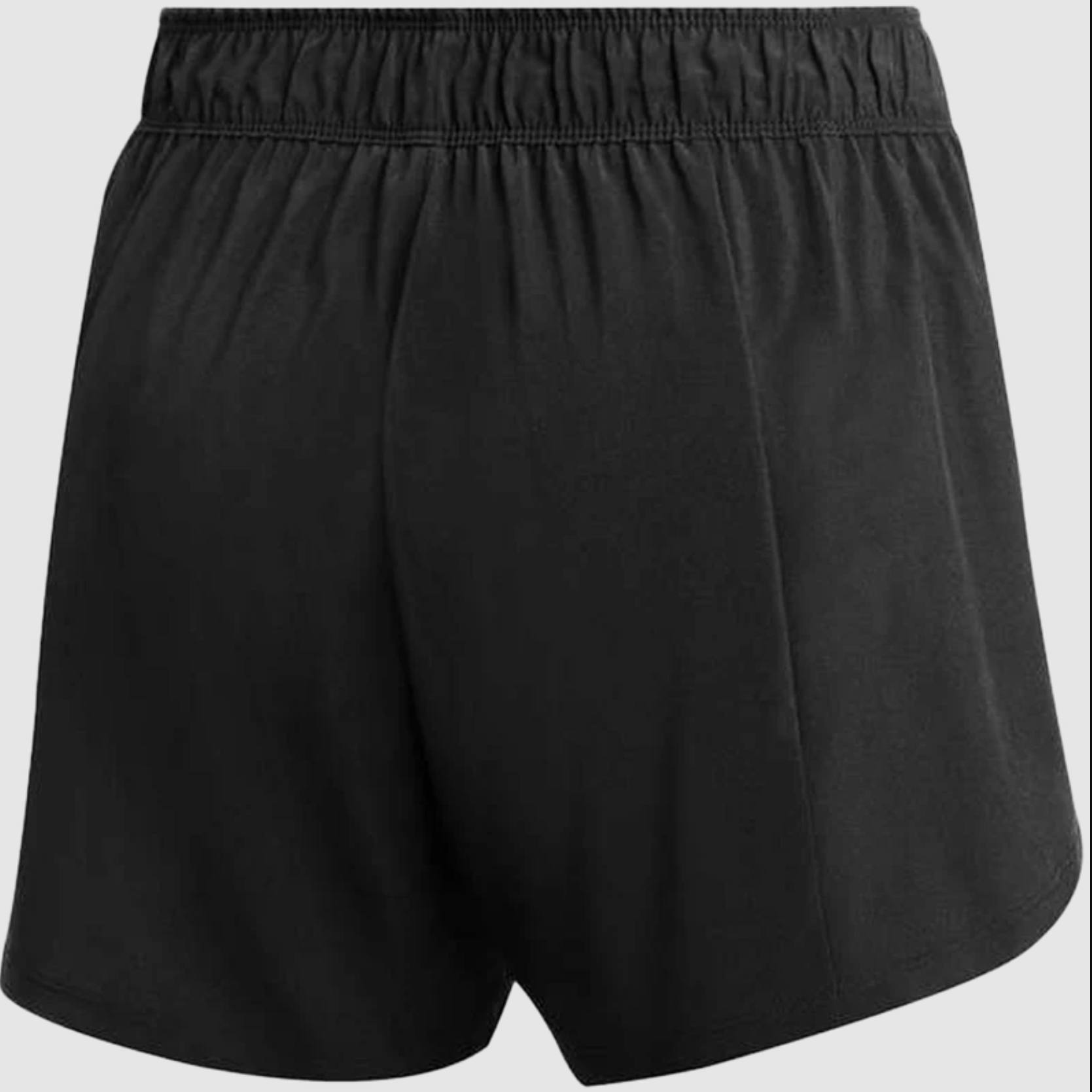 Back view of black athletic shorts with a gathered elastic waistband and loose fit.