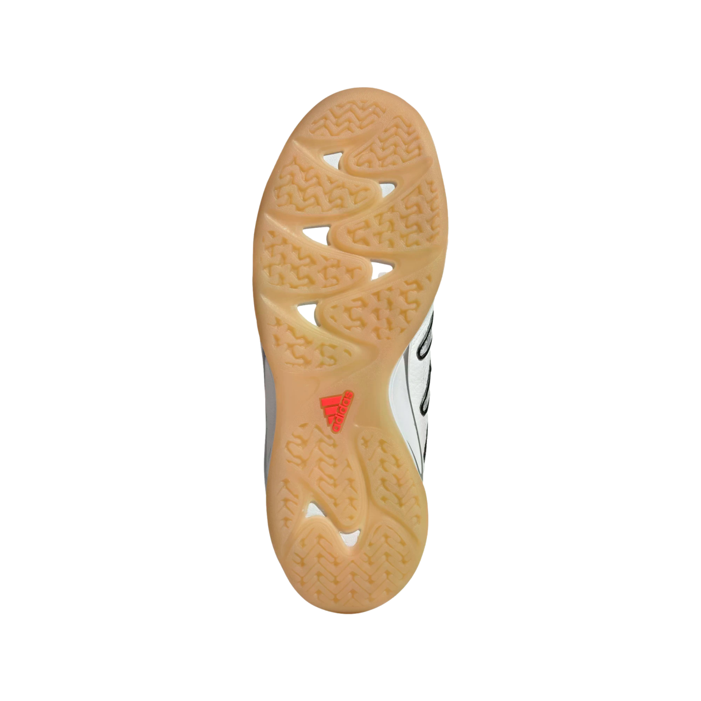 Gum rubber outsole of a white Adidas shoe with wavy tread and an orange logo against a black background.