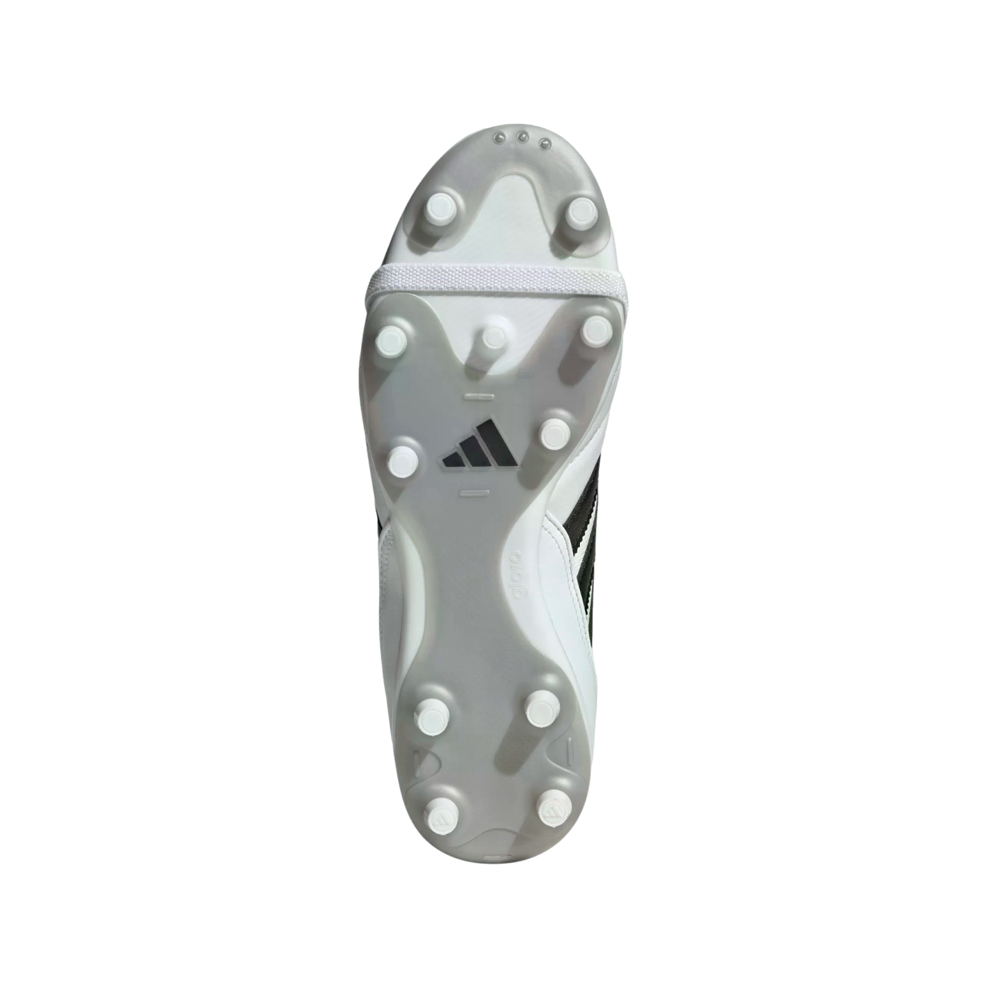 The bottom of a white Adidas soccer cleat featuring a frosted soleplate, white circular studs, and a black Adidas logo against a black background.