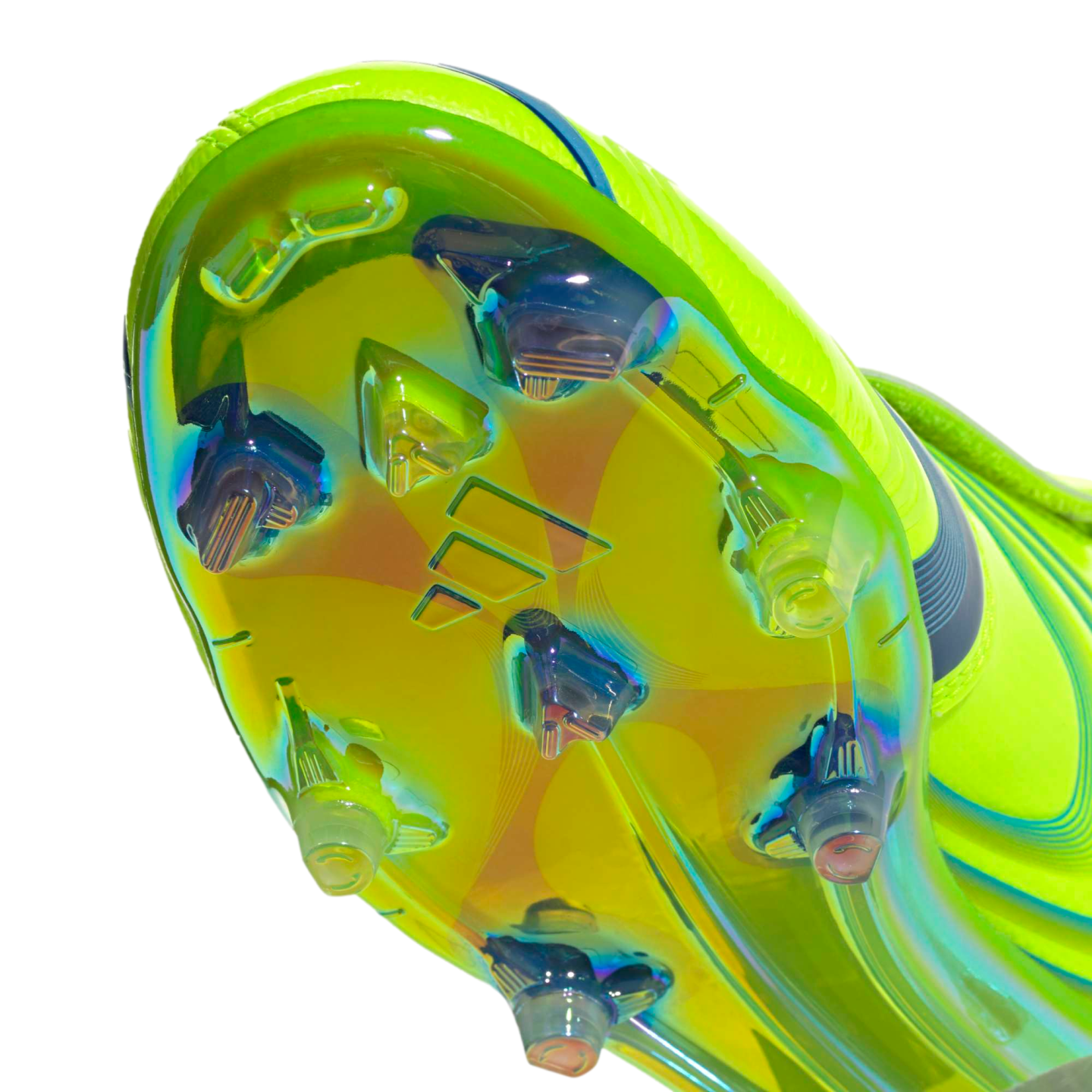Close-up of an iridescent lime green Adidas soccer cleat soleplate with clear and blue studs, showing its holographic finish and brand logo.