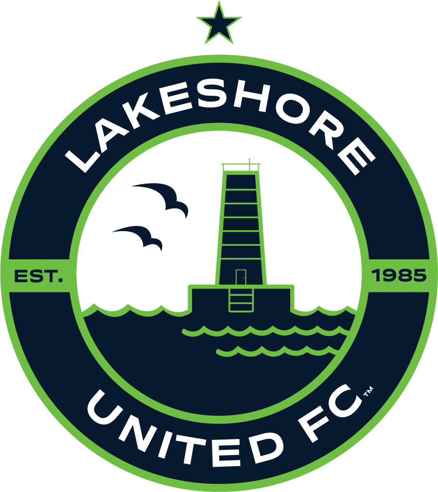 Lakeshore United FC circular logo in navy and green featuring a lighthouse, seagulls, waves, and a star. Text includes "LAKESHORE UNITED FC" and "EST. 1985".