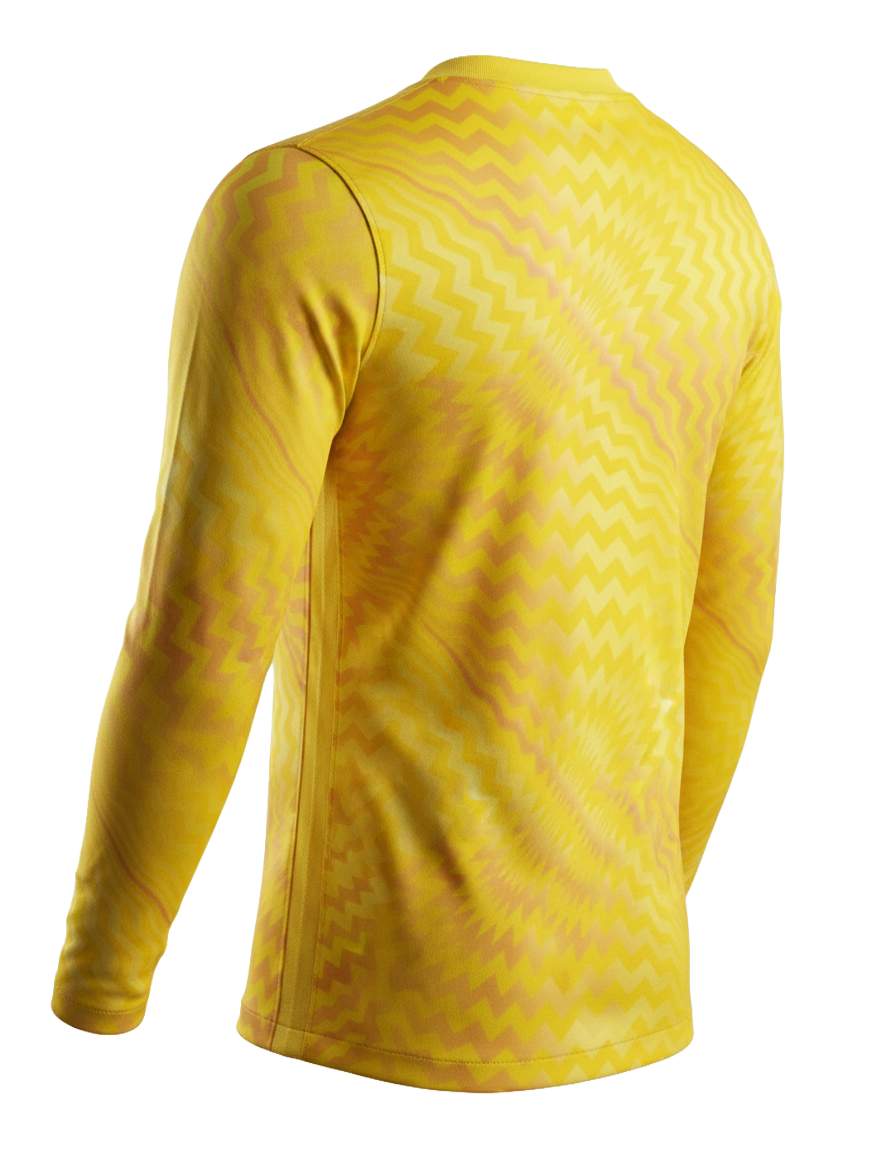 Back view of a yellow long-sleeved athletic jersey with an orange zigzag pattern, shown against a vertically striped glitch-effect background.