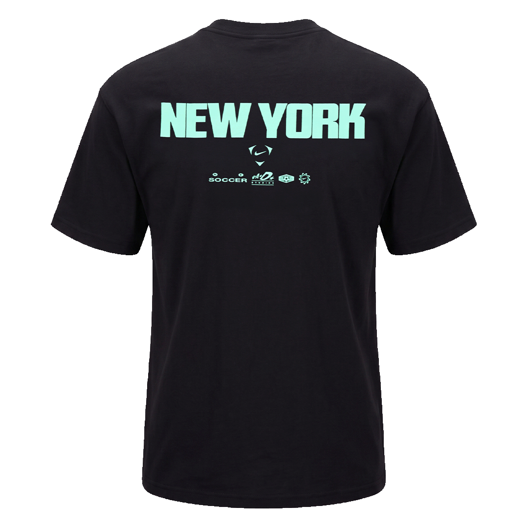Back view of a black short-sleeve t-shirt featuring "NEW YORK" in large mint green block letters above smaller Nike Soccer logos.