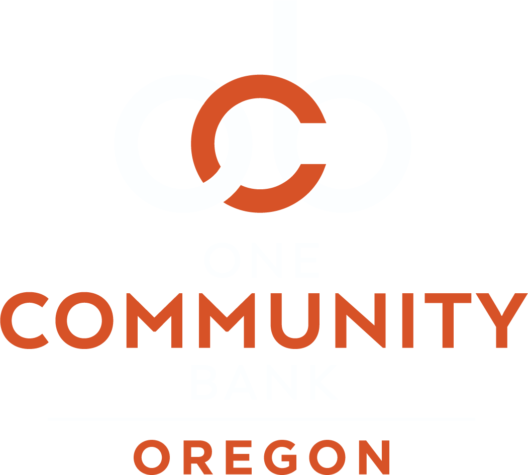 Logo for One Community Bank Oregon featuring an orange interlocking "C" icon above the words "COMMUNITY" and "OREGON" in bold orange text.