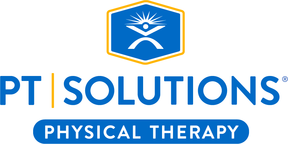 PT Solutions Physical Therapy logo with a blue hexagon sunburst human icon above the text "PT | SOLUTIONS" and "PHYSICAL THERAPY" in blue and white.