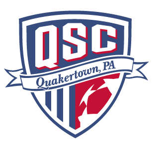 Shield-shaped logo for QSC Quakertown, PA. The red, white, and blue design features a central banner, vertical stripes, and part of a soccer ball.