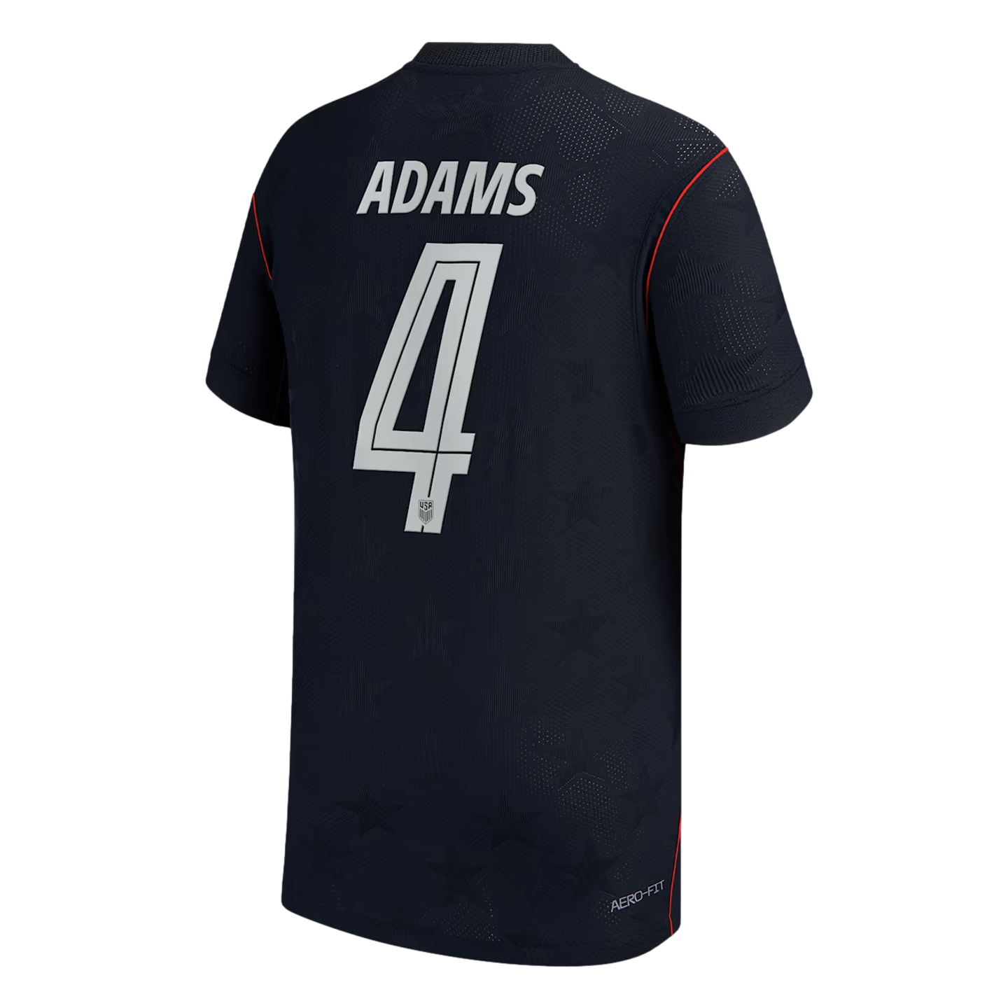 The back of a navy blue soccer jersey featuring the name "ADAMS" and the number "4" in white. The jersey has a subtle tonal star pattern across the fabric and thin red piping on the shoulders.