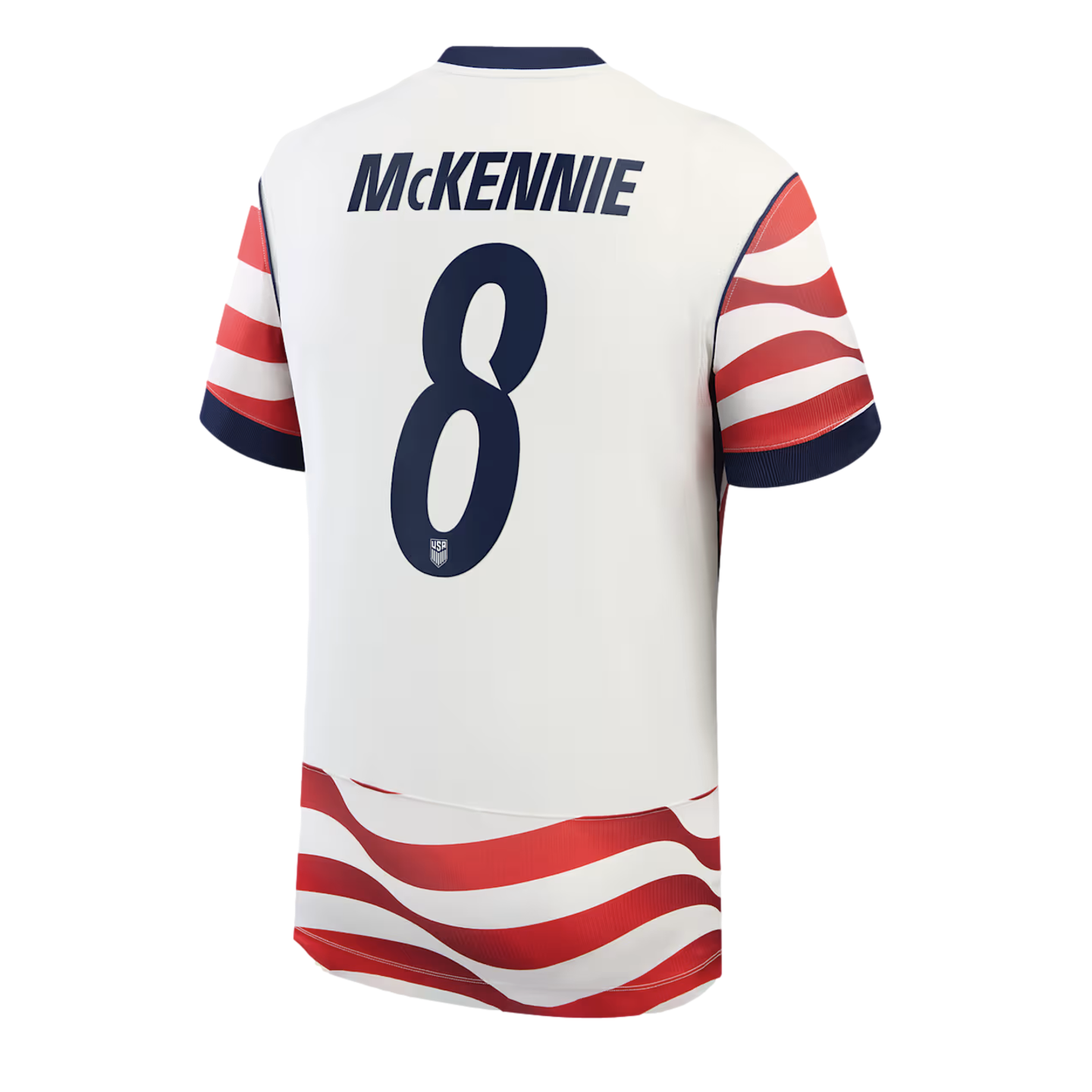 The back of a white USMNT soccer jersey with 'MCKENNIE' and the number '8' in navy blue. Wavy red and white stripes detail the sleeves and bottom hem.