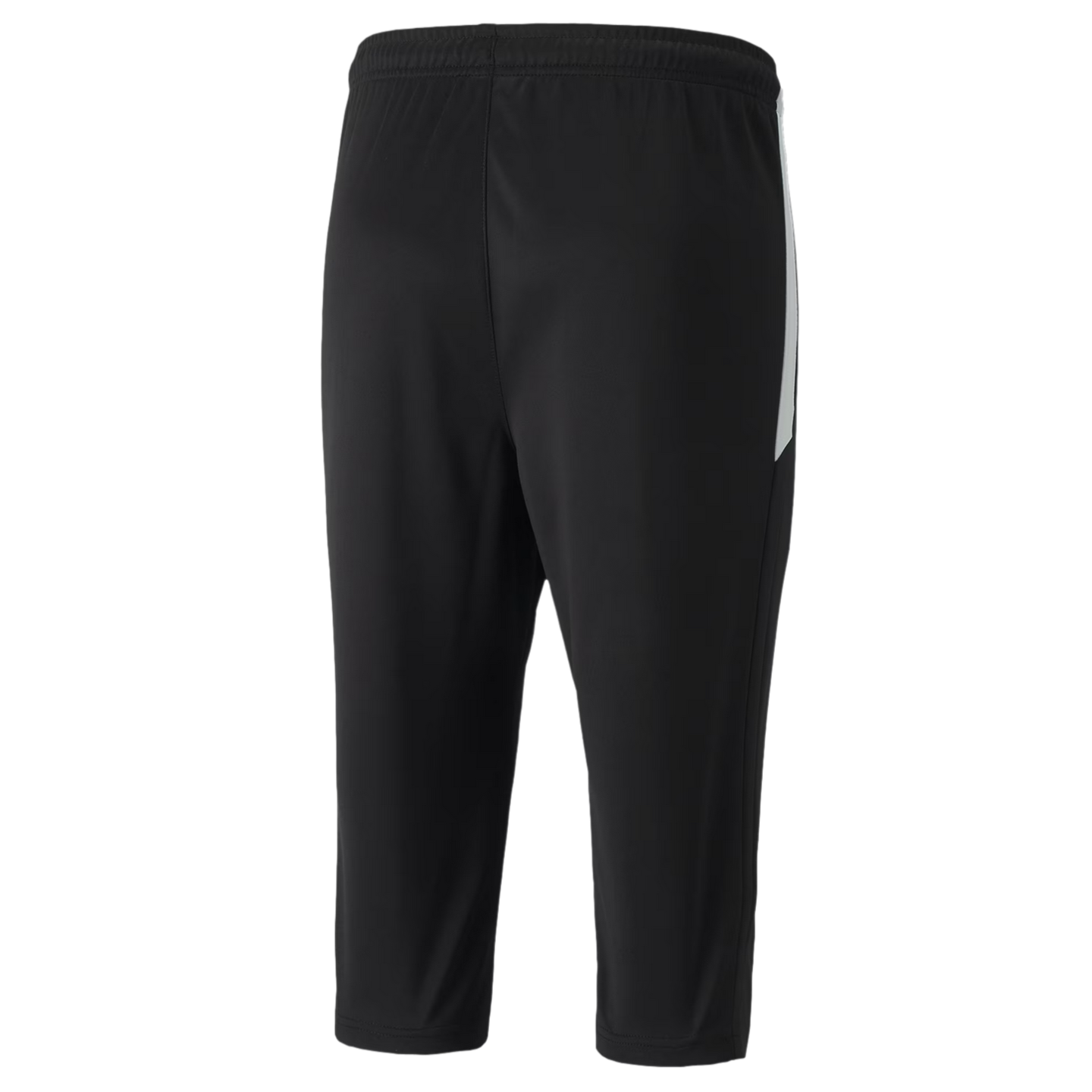 A rear view of three-quarter length black athletic training pants featuring an elastic waistband and a white panel on the right side.