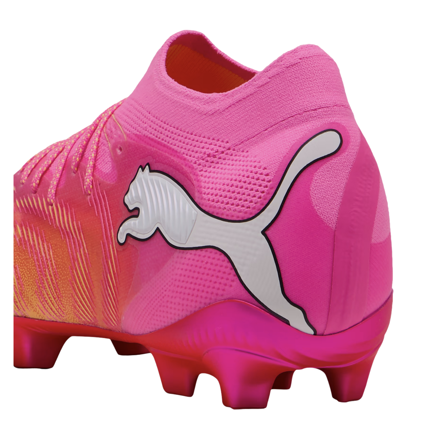 Vibrant pink Puma soccer cleat featuring a white logo, metallic magenta studs, and an orange-to-pink gradient textured upper.