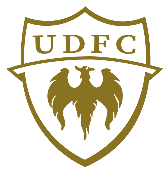 A gold and black shield crest featuring the text "UDFC" above a stylized phoenix with spread wings.