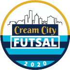 A circular logo for CCF16 - Cream City Futsal "HAT" Color featuring a black outline of a city skyline at the top. The center contains the text "Cream City" in gold serif font on a dark blue background, above the word "FUTSAL" in large white block letters on a light blue background. The bottom half consists of alternating light and dark blue horizontal stripes, with the year "2020" written in white at the very bottom. A golden-yellow border arcs around the top half of the circle.