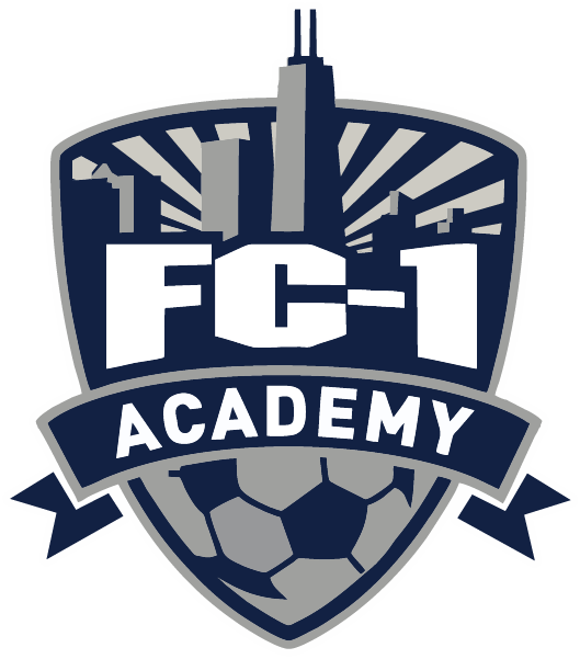 A shield-shaped FC1-2 - - FC1 Academy "HAT" PATCH featuring a navy blue Chicago skyline, white "FC-1" text, a navy blue banner with the word "ACADEMY", and a grey soccer ball at the base.