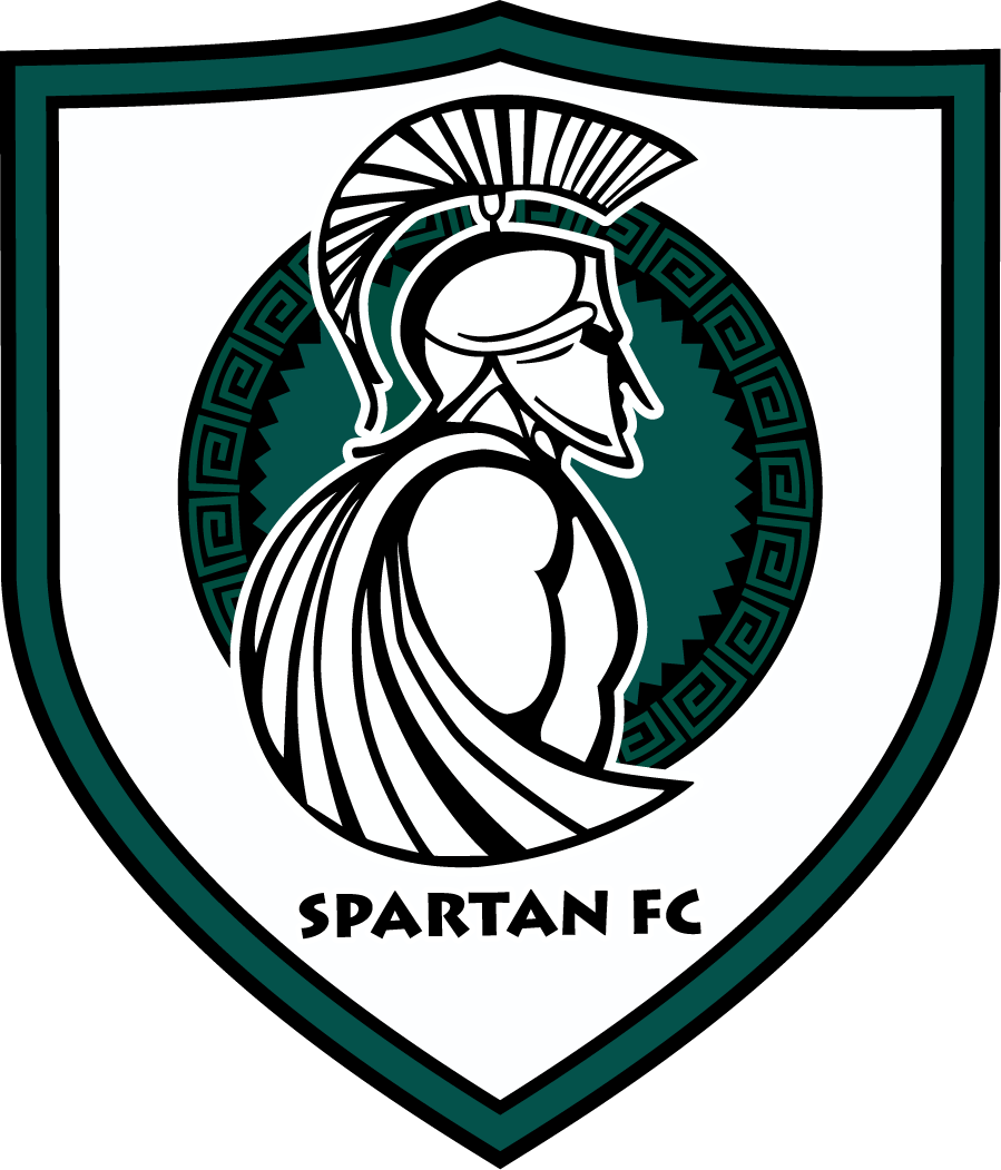 A shield-shaped crest for Spartan FC featuring a white and black Spartan warrior profile in a plumed helmet and cloak. Behind the warrior's head is a dark green circular element with a Greek key pattern. The text "SPARTAN FC" is displayed in black at the bottom.