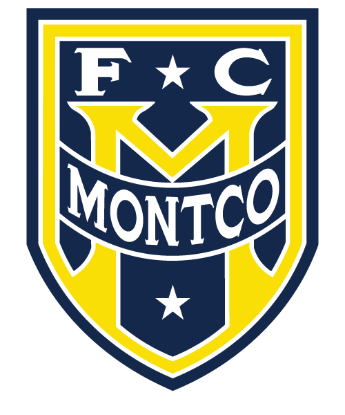 A shield-shaped logo for FMONT2 - FC Montco "CREST" FULL Color, featuring a navy blue, yellow, and white color scheme. A large yellow "M" is layered behind a curved navy blue banner that says "MONTCO" in white capital letters. At the top, a white "F" and "C" flank a white five-pointed star, and a second white star is centered at the bottom.