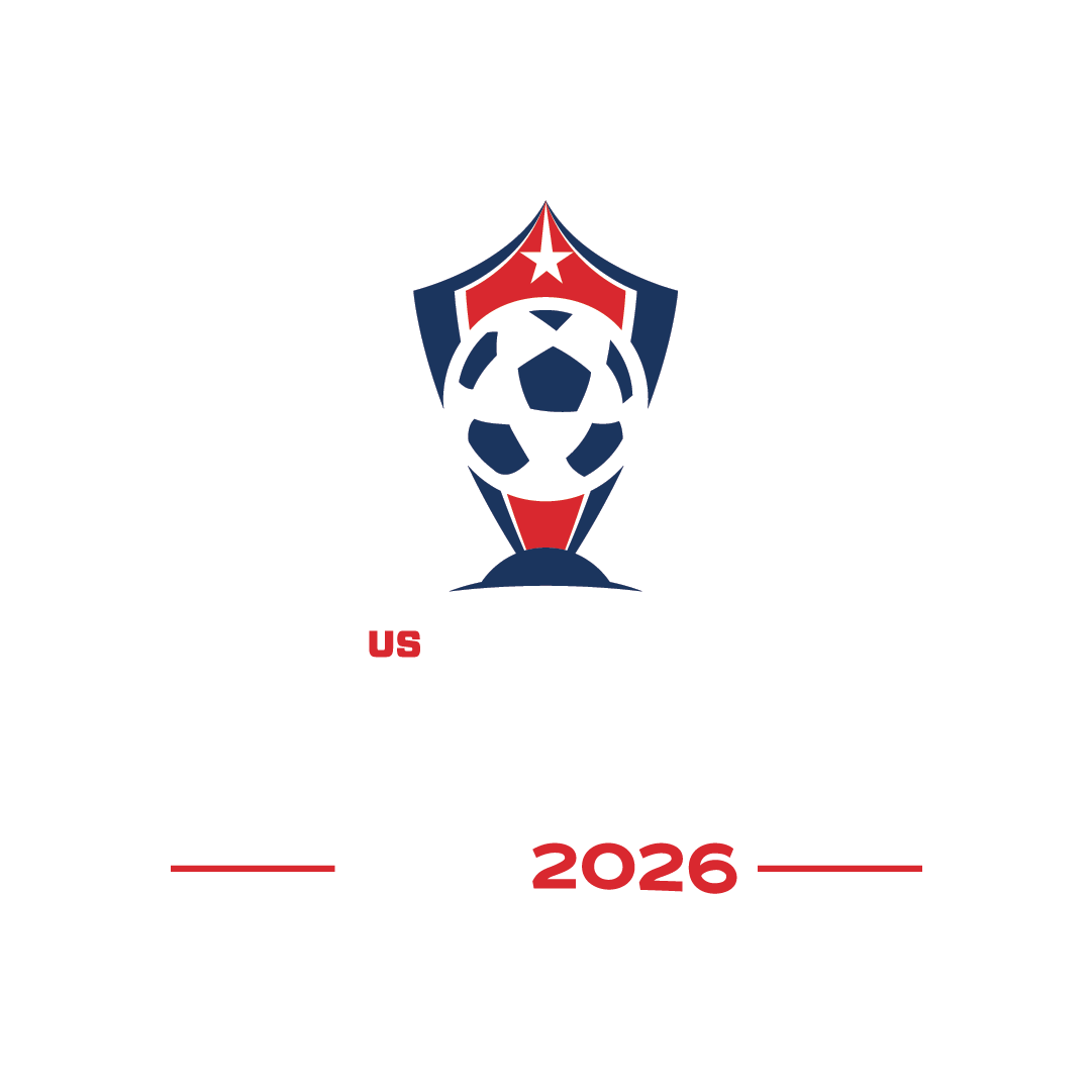 Red, white, and blue soccer logo featuring a trophy-style shield with a soccer ball and star. Below, red text reads "US" and "2026" between two horizontal lines.