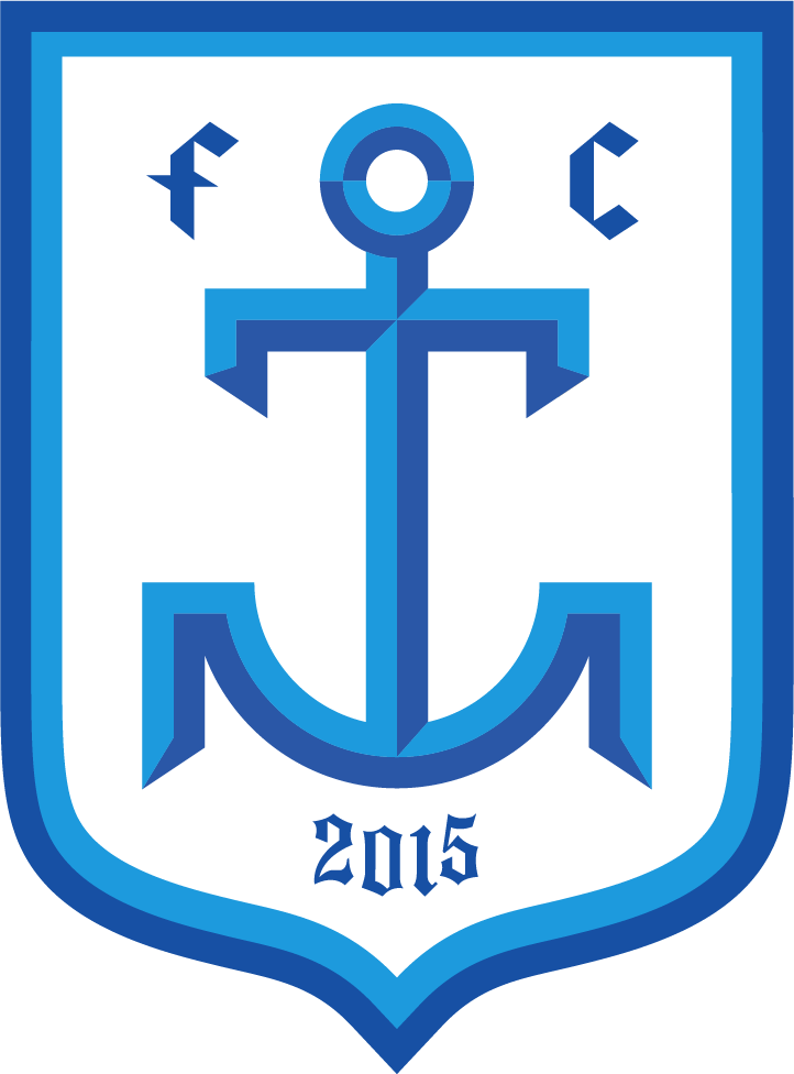 A stylized athletic shield crest for the Milwaukee Torrent soccer club, featuring a blue, faceted anchor on a white background. The anchor is flanked by a gothic-style lowercase "f" and "c" near the top and the year "2015" at the bottom. The crest is framed by a double blue border.