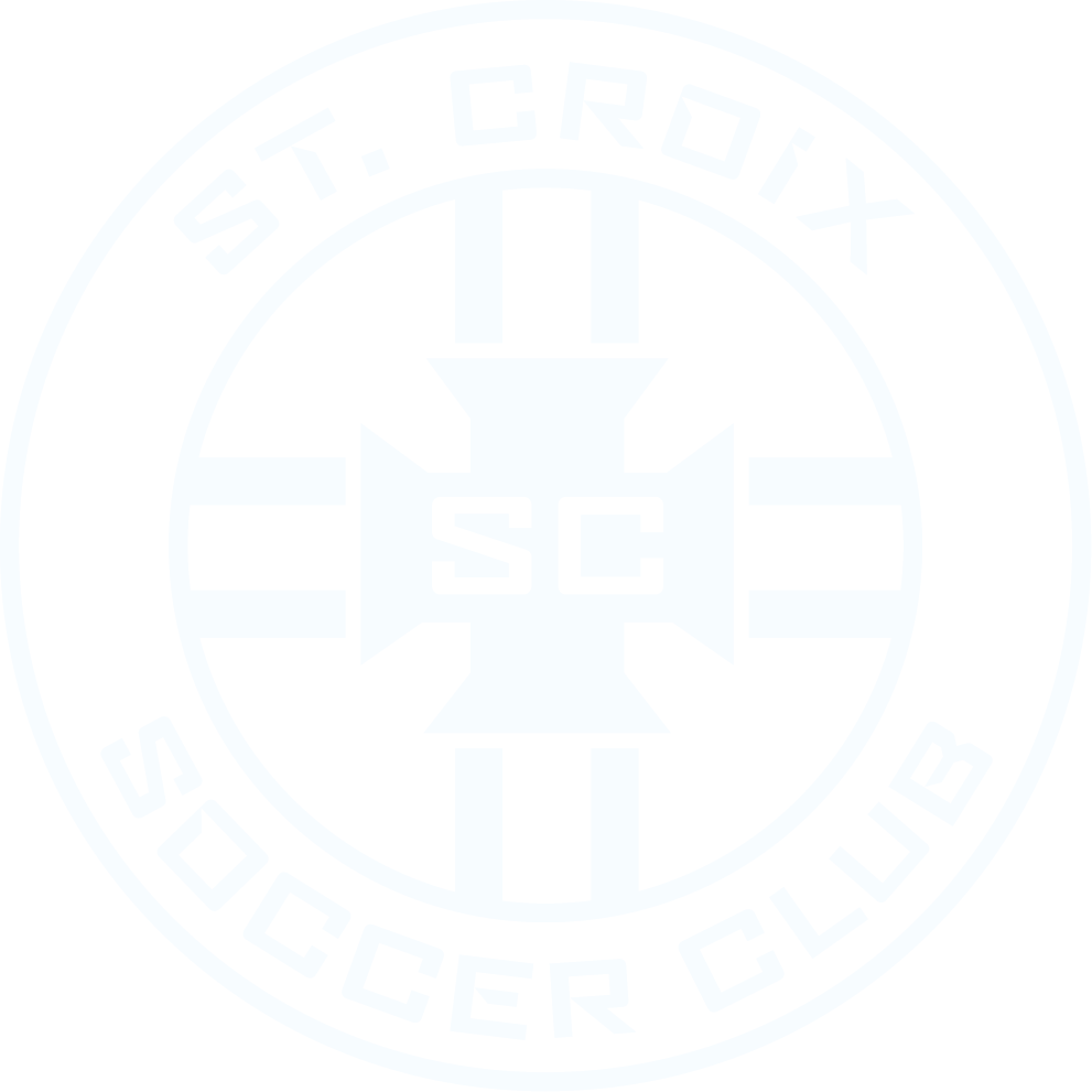 A light blue circular crest for St. Croix Soccer Club featuring the club name around a central heraldic cross with "SC" in the middle.