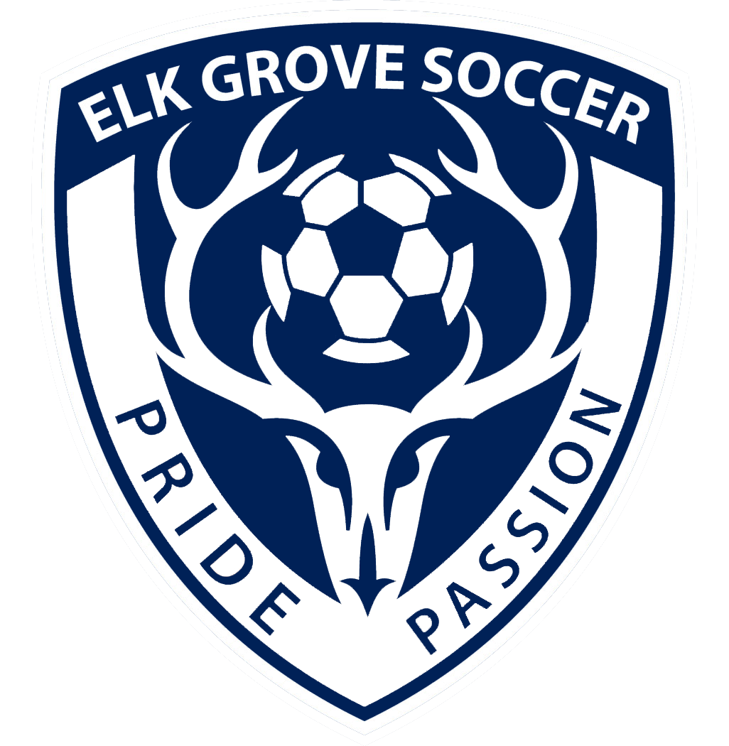 FCEG CREST: A navy blue and white shield-shaped logo for Elk Grove Soccer featuring an elk skull with large antlers cradling a soccer ball, with the words “PRIDE” and “PASSION” displayed on the sides.