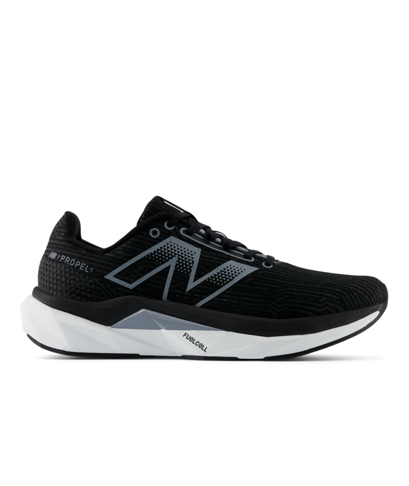 Side view of a black New Balance FuelCell Propel running shoe with a large grey "N" logo and a thick white midsole.