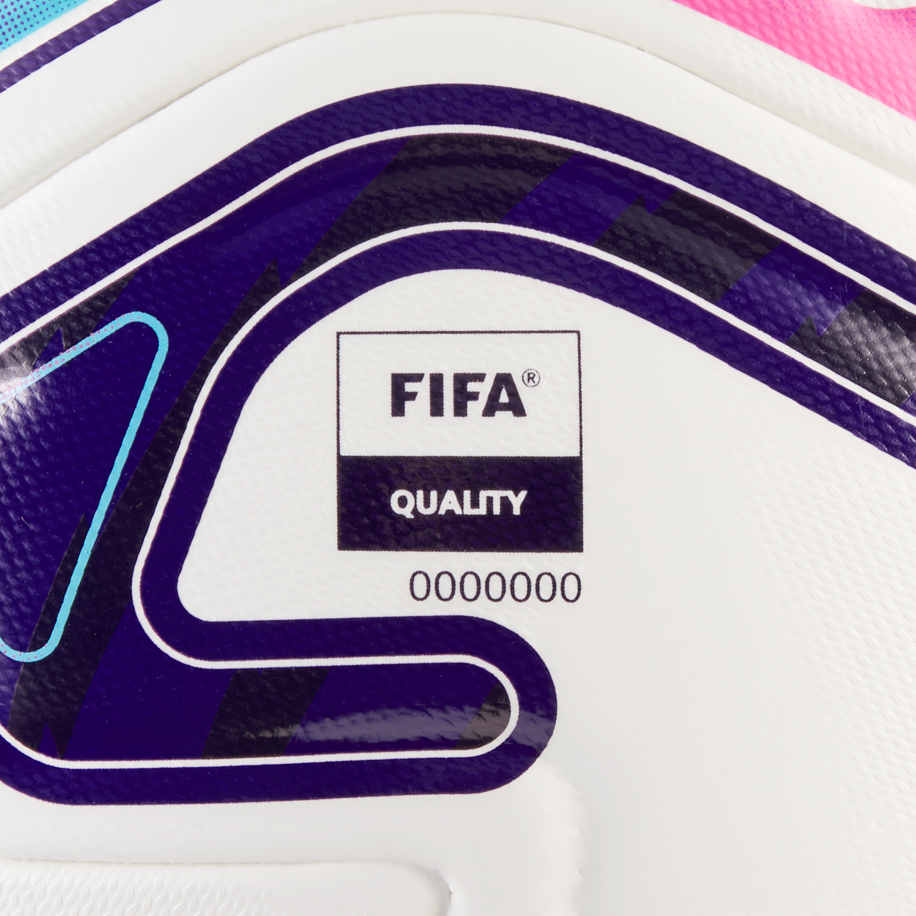 Close-up of a white soccer ball featuring a FIFA QUALITY logo and serial number 0000000 set against purple, blue, and pink graphic designs.