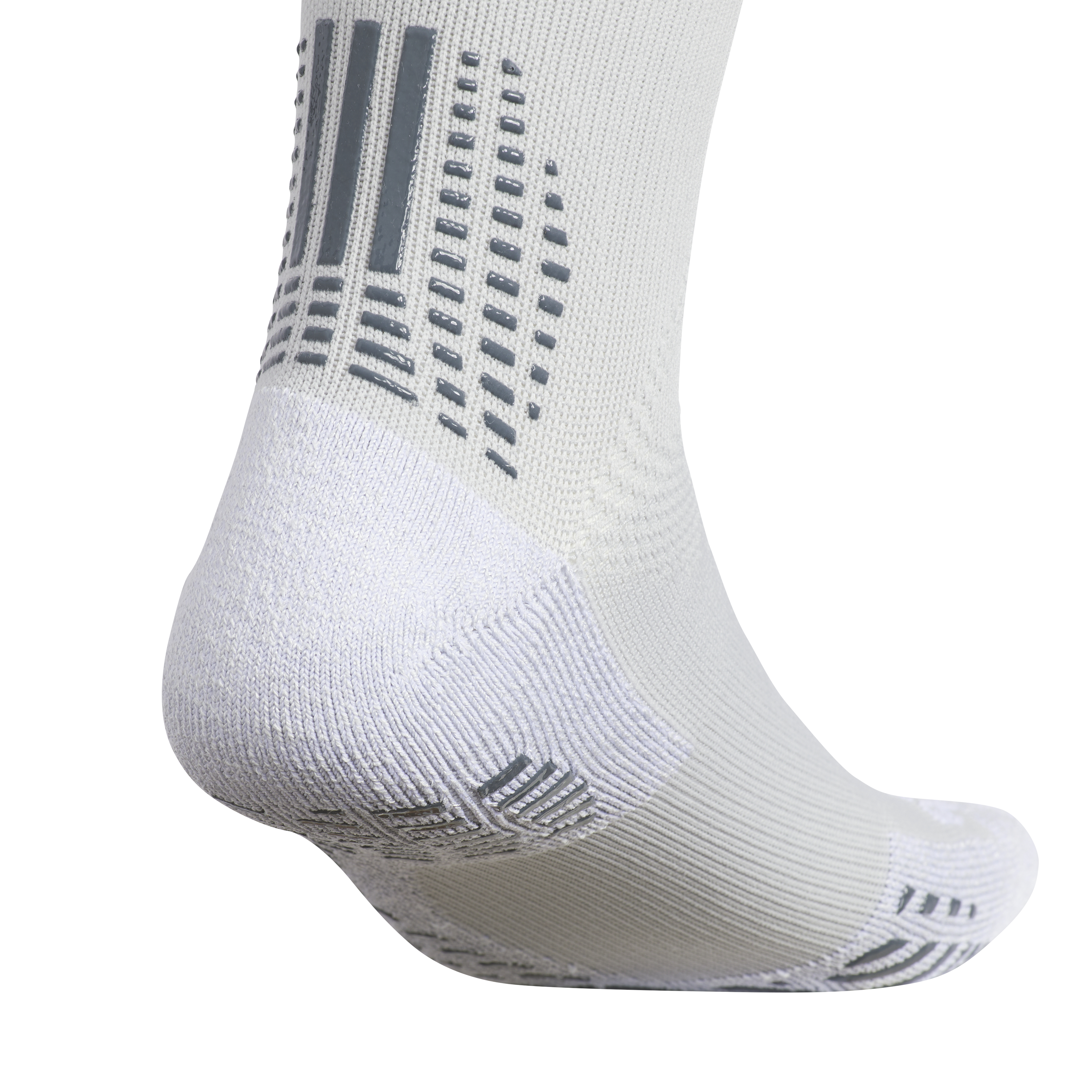 White performance sock featuring gray silicone grip patterns on the heel and ankle for enhanced traction.