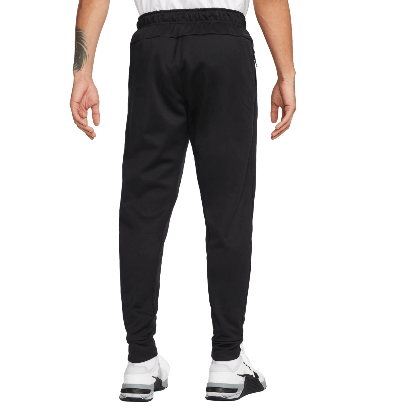 Pantalones de fitness cónicos Therma de Nike
