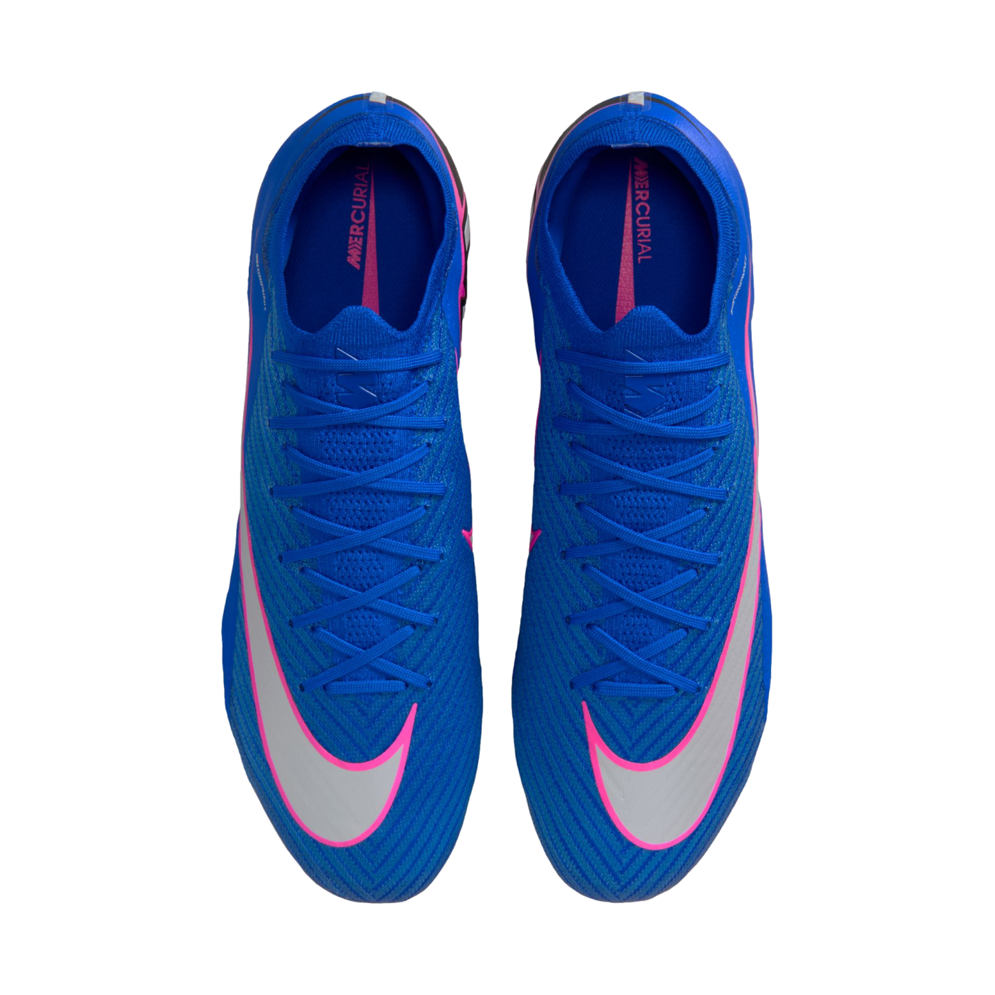 Top-down view of blue Nike Mercurial soccer cleats with white and pink accents, featuring large white swooshes on the toes, against a black background.