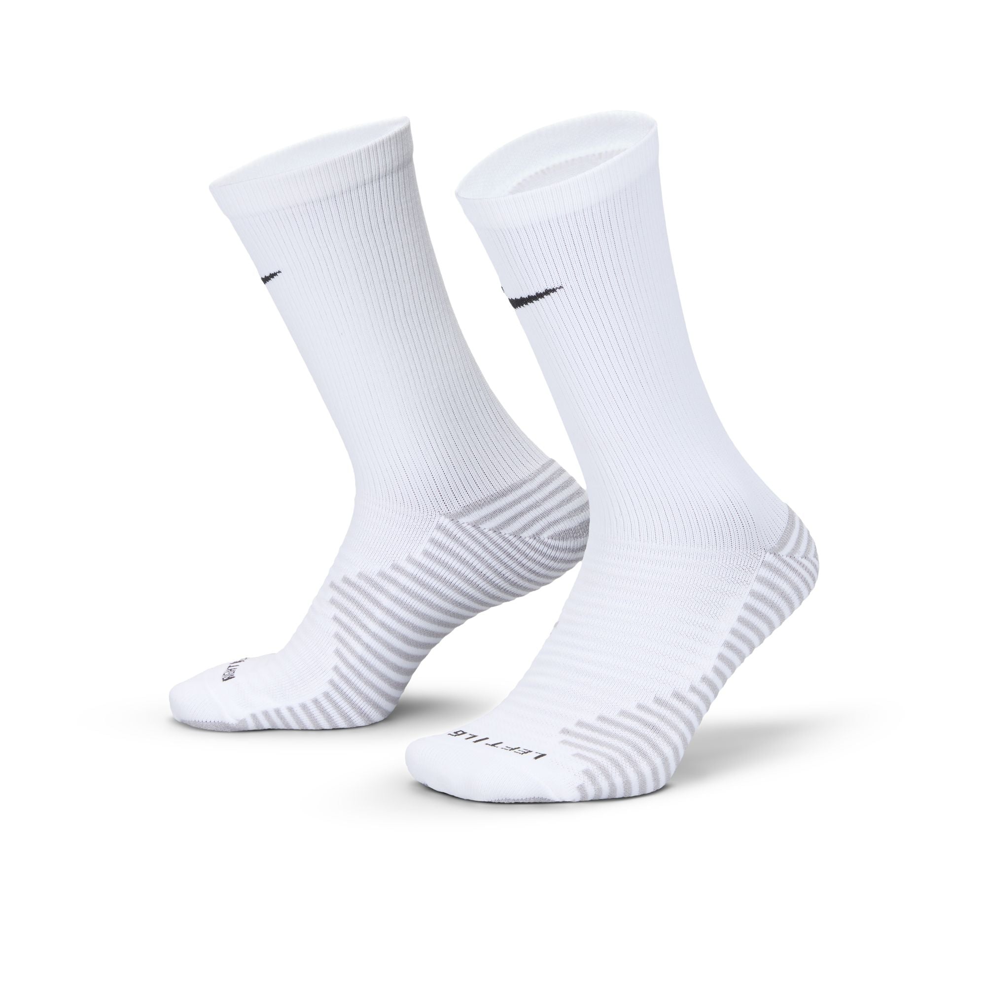 Pair of white Nike crew socks with black swoosh logos, grey striped cushioning on the heels and soles, and "LEFT/LG" and "RIGHT/LG" size markings on the toes.