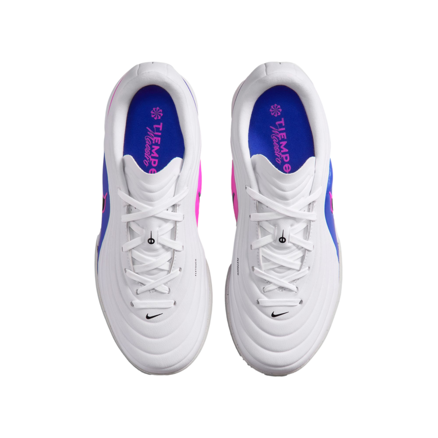 Top-down view of white Nike Tiempo Maestro soccer shoes. Features white laces, blue insoles with pink branding, and vibrant pink and blue accents along the sides.