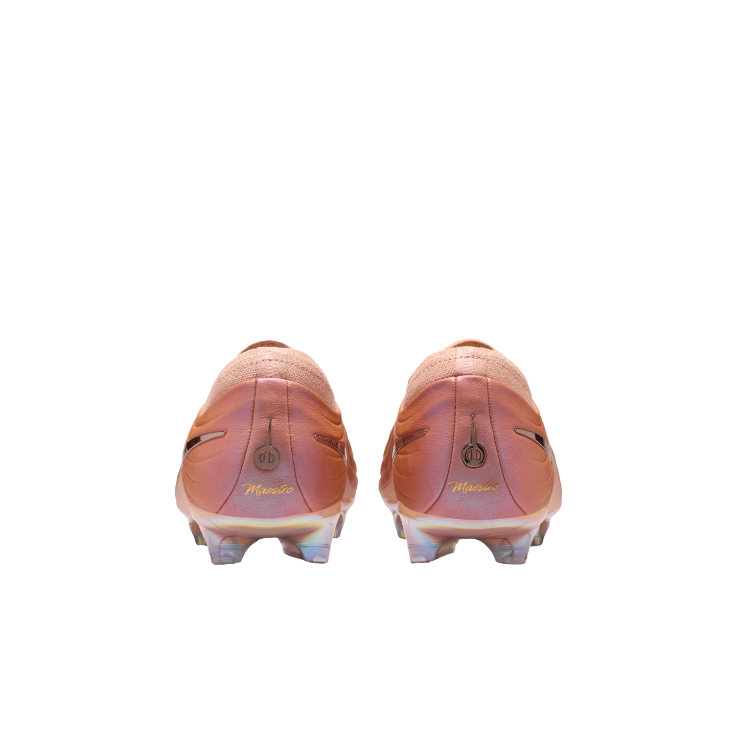 Heel view of two copper-colored soccer cleats with "Maestro" in gold script, set against a solid black background.