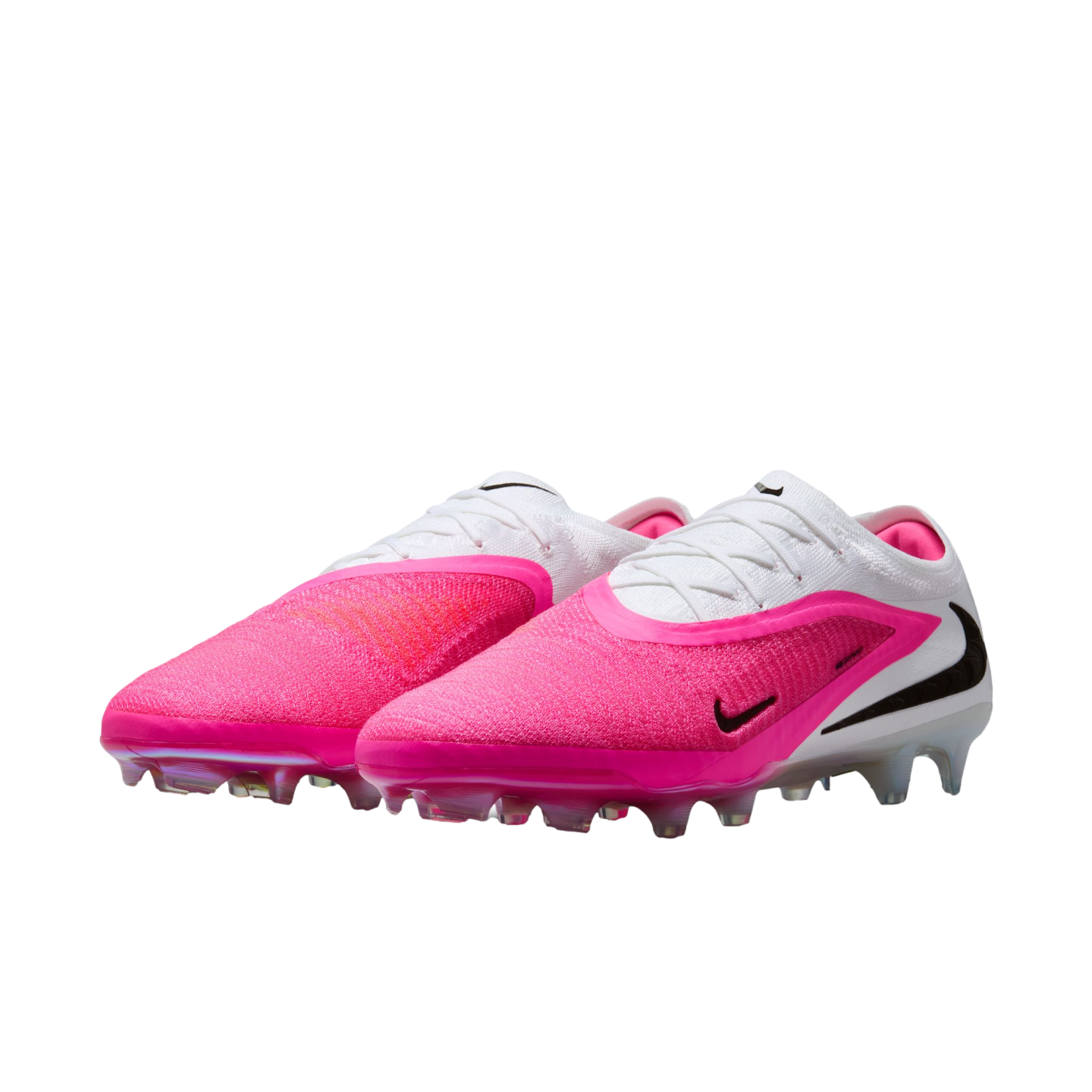 A pair of Nike Phantom Luna II soccer cleats in bright pink and white with black swooshes and clear studs against a white background.