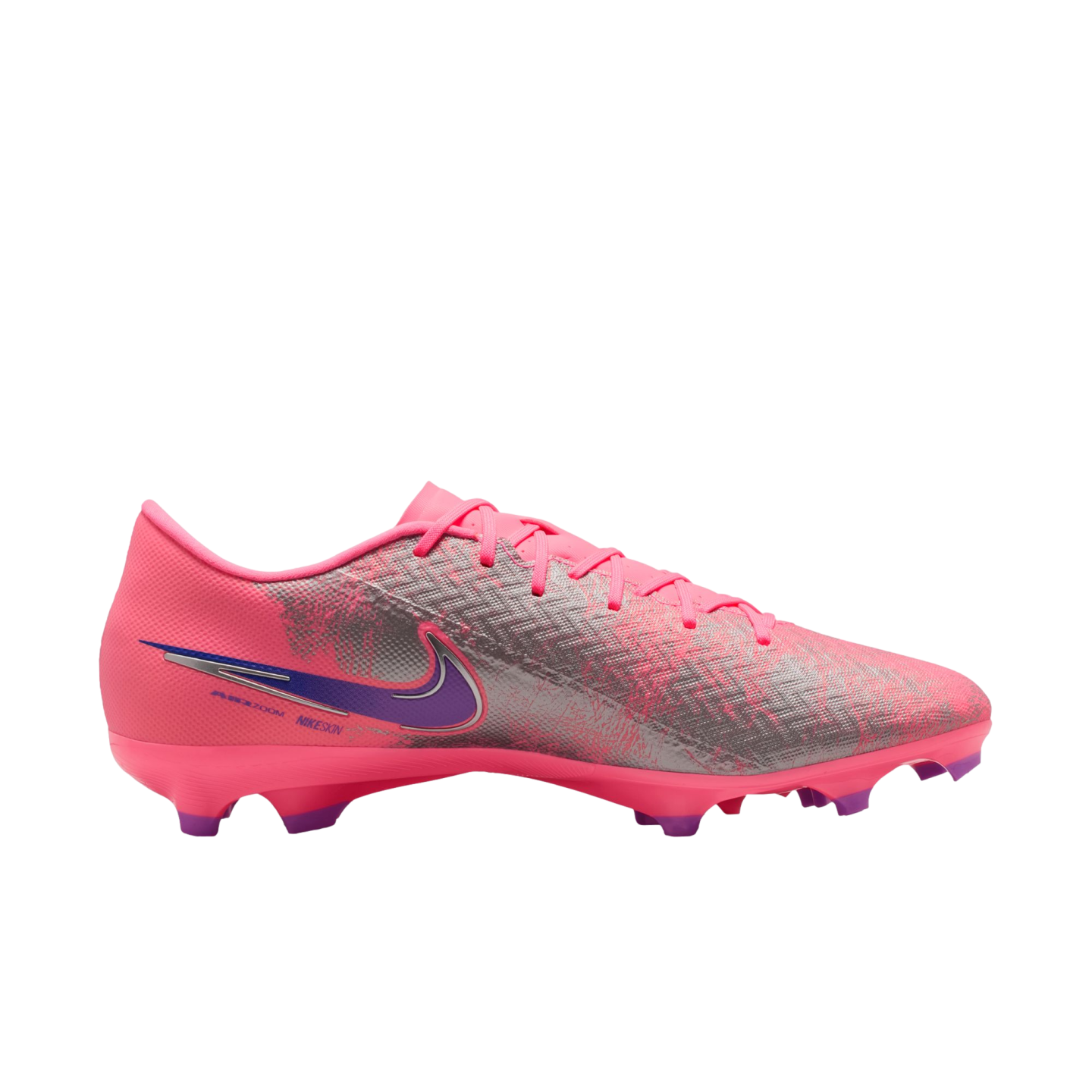 Side view of a bright pink Nike soccer cleat with metallic silver textures and a purple swoosh, set against a black background.