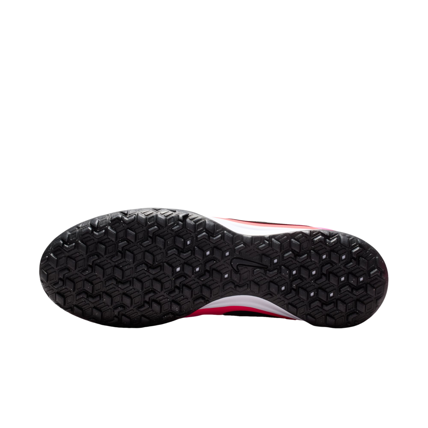 Bottom view of a Nike athletic shoe featuring a black textured rubber outsole with a geometric pattern, with pink and white accents on the midsole, against a white background.
