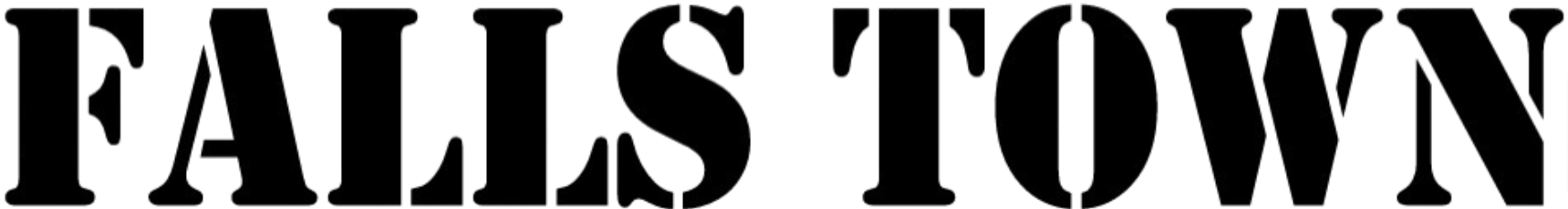 A horizontal banner featuring the word "FALLSTOWN" in a dark, textured serif font against a solid black background. The letters have a faint, speckled appearance, making them barely visible against the dark backdrop.