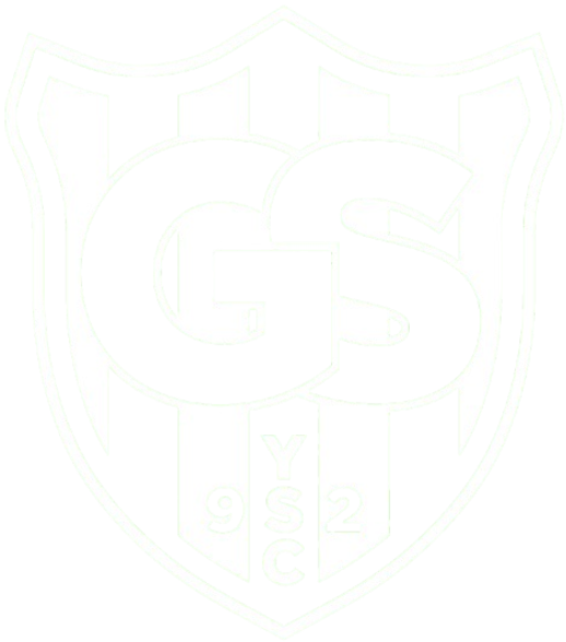 A shield-shaped sports crest featuring black and white vertical stripes. Large, stylized black letters "GS" are positioned in the center. Below them, the letters "Y," "S," and "C" are stacked vertically, with the numbers "9" and "2" flanking the middle letter "S." The entire crest has a thin, faint green outline.