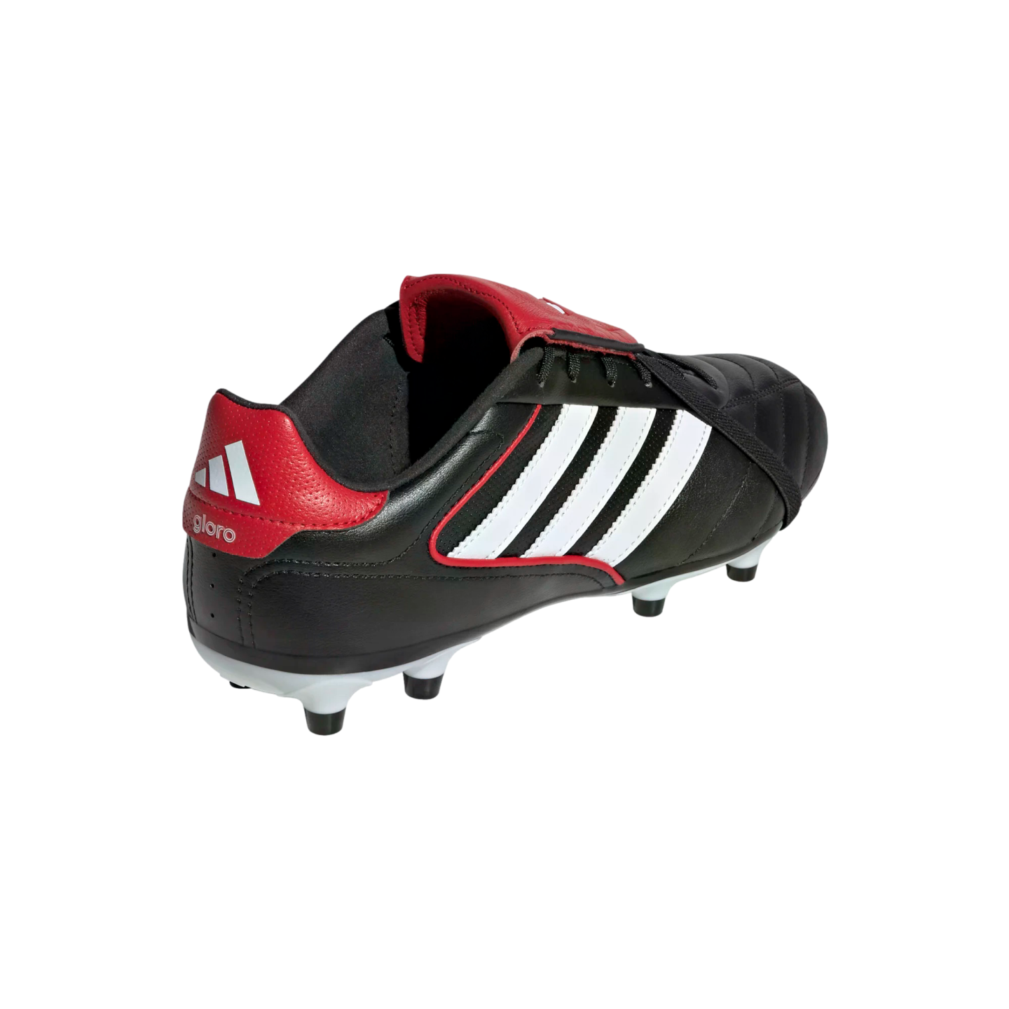 A rear view of a black leather Adidas Gloro soccer cleat with signature white stripes and a red heel and fold-over tongue against a black background.