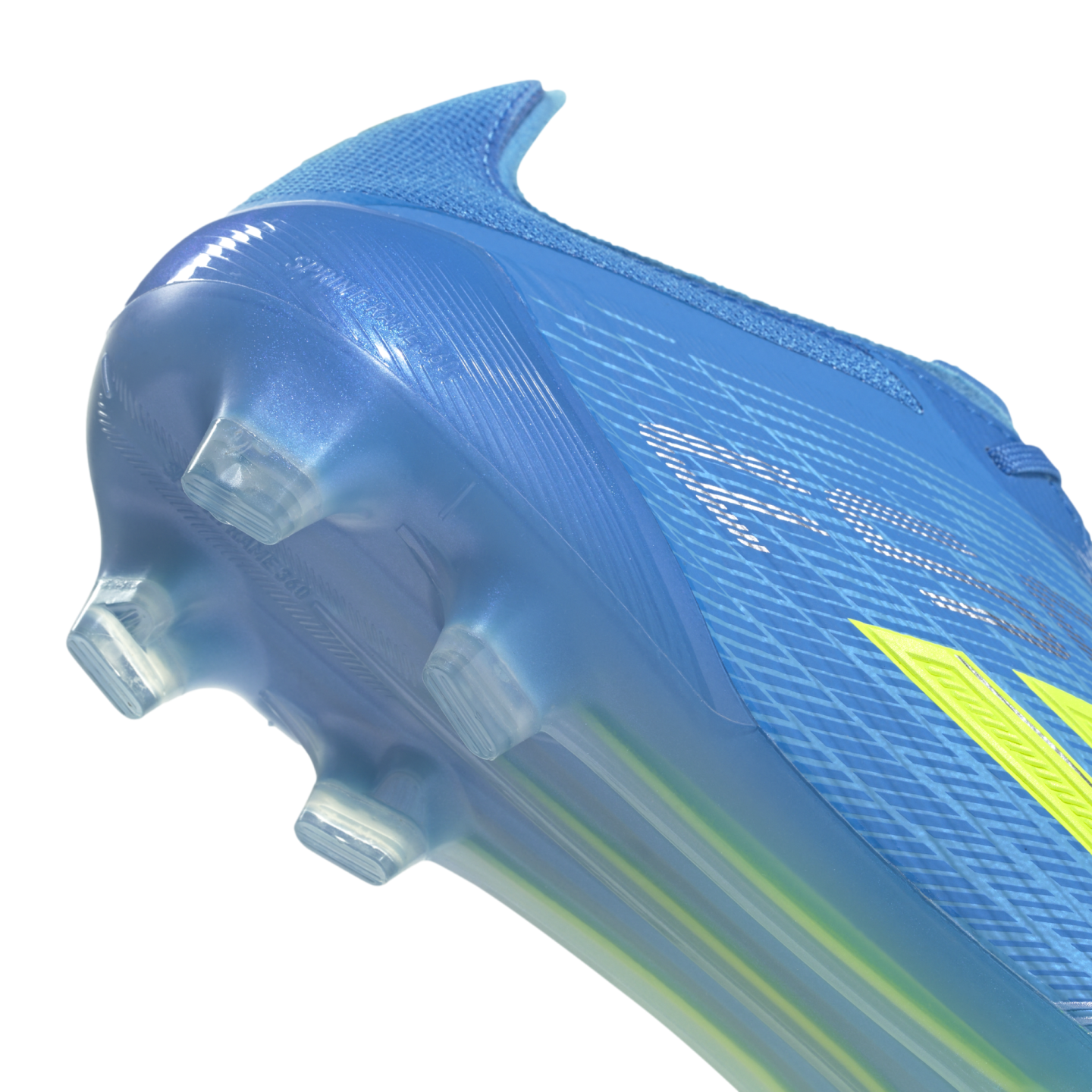 A close-up shot of the heel and translucent blue soleplate of a bright blue soccer cleat against a solid black background. The semi-transparent soleplate features clear integrated studs and embossed "SPEEDFRAME 360" text, with partial yellow accents visible on the side.