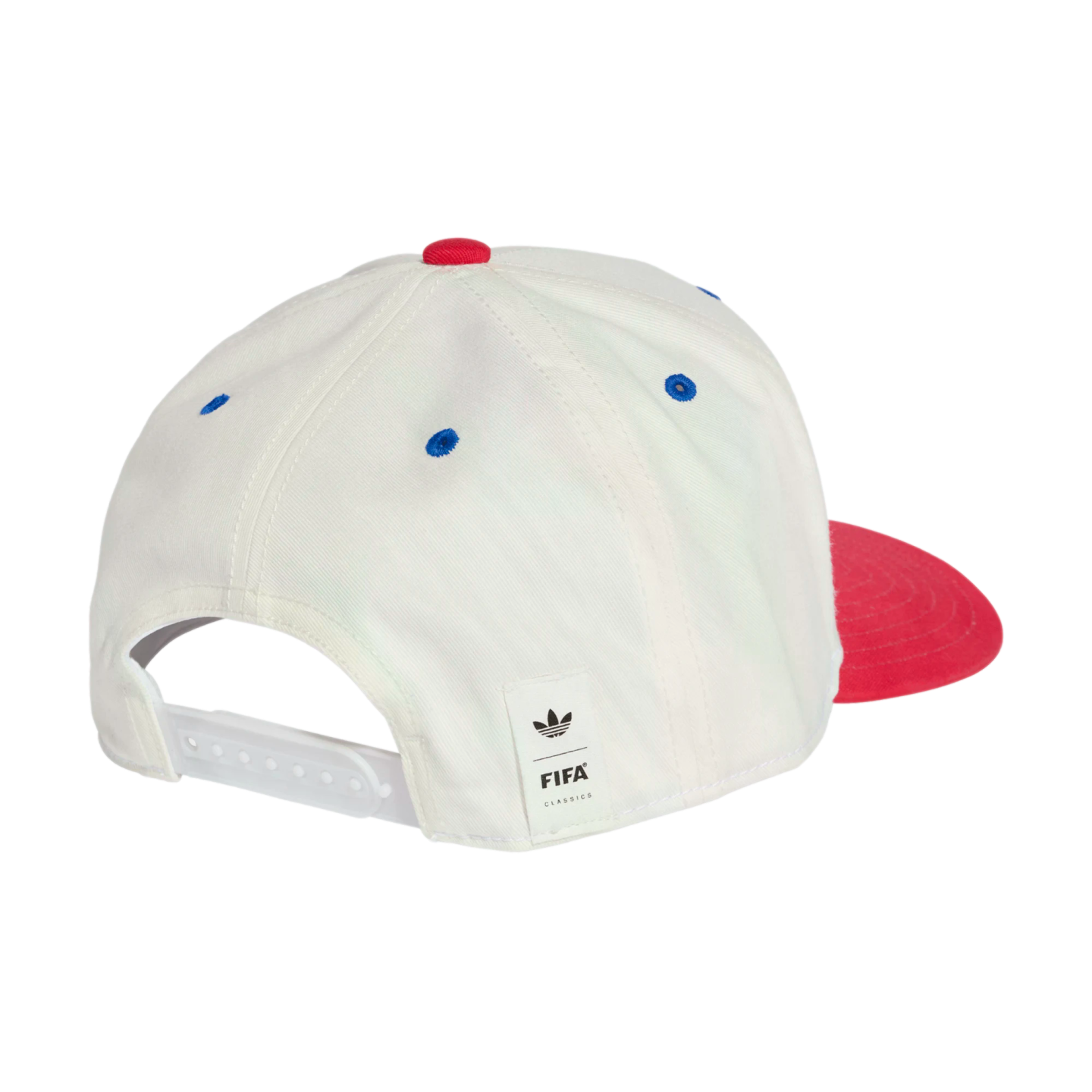 A rear view of a white six-panel baseball cap with blue embroidered eyelets and a red top button. A portion of the red brim is visible on the right side. It features a white snapback closure and a small white tag on the back with the Adidas trefoil logo and "FIFA CLASSICS" text. The hat is isolated on a black background.